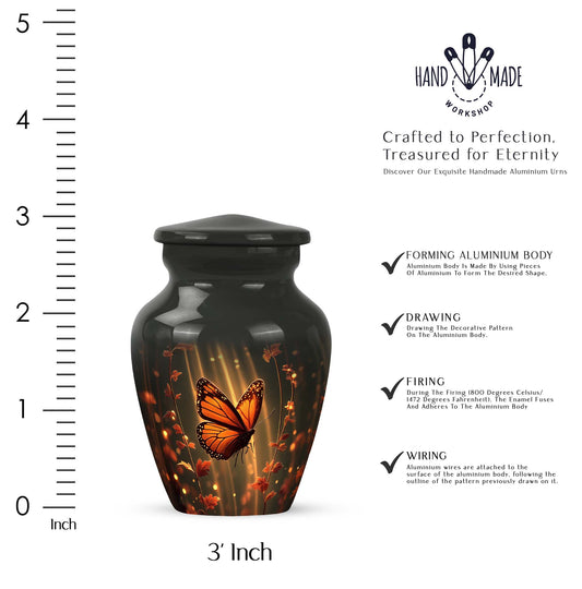 Dark Black Butterfly Cremation Urn close-up of engraving and surface detail - elegant classic butterfly relief with fine detailing - mini keepsake memorial for portion of cremation ashes