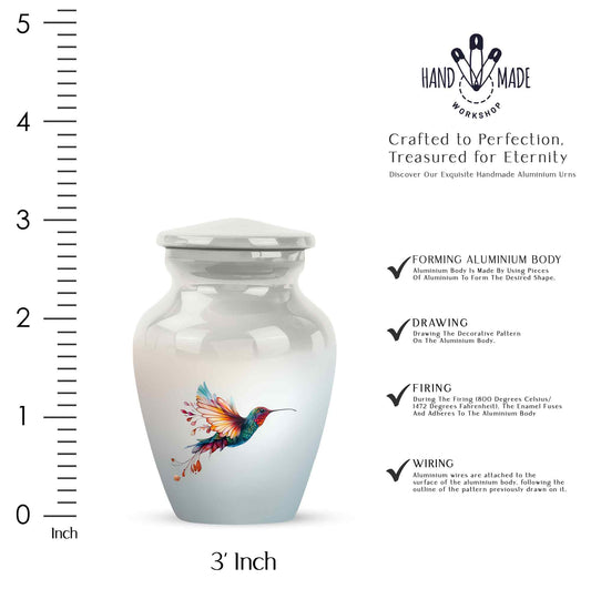 Frosted Silver Hummingbird Cremation Urn close-up of engraving and surface detail - traditional hummingbird engraving with hand-polished finish - mini keepsake memorial for portion of cremation ashes