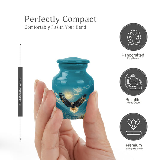 Sea Green Teal Eagle Cremation Urn close-up of engraving and surface detail - classic sculpted eagle pattern on smooth aluminum - mini keepsake memorial for portion of cremation ashes