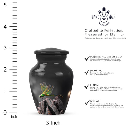 Rich Black Dragonfly Cremation Urn close-up of engraving and surface detail - timeless dragonfly motif etched into premium metal - mini keepsake memorial for portion of cremation ashes