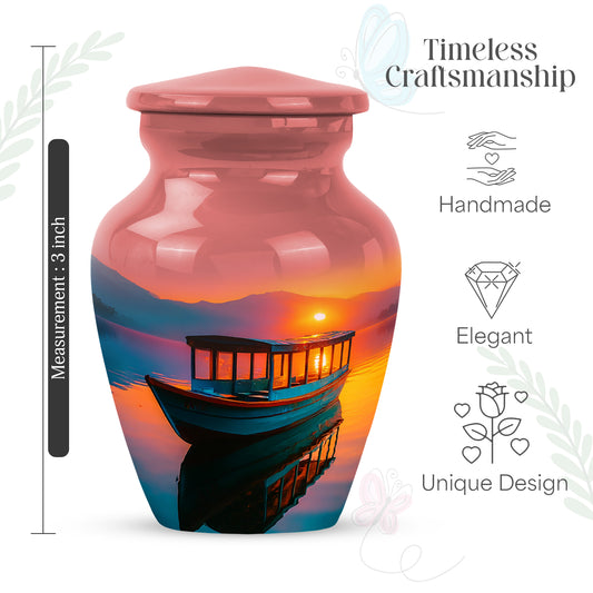 Garnet Red Boat Cremation Urn close-up of engraving and surface detail - timeless boat motif etched into premium metal - mini keepsake memorial for portion of cremation ashes