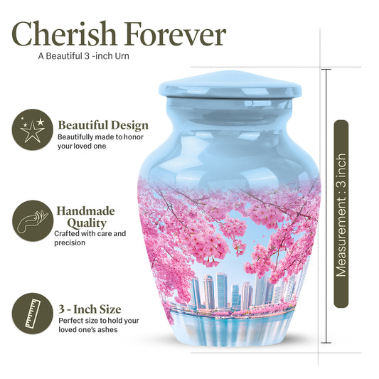 Pastel Blue Cherry Blossom Cremation Urn close-up of engraving and surface detail - timeless cherry blossom motif etched into premium metal - mini keepsake memorial for portion of cremation ashes