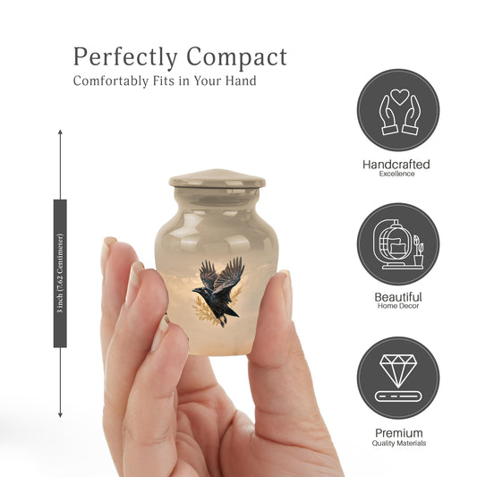 Matte Gold Crow Cremation Urn close-up of engraving and surface detail - traditional crow engraving with hand-polished finish - mini keepsake memorial for portion of cremation ashes