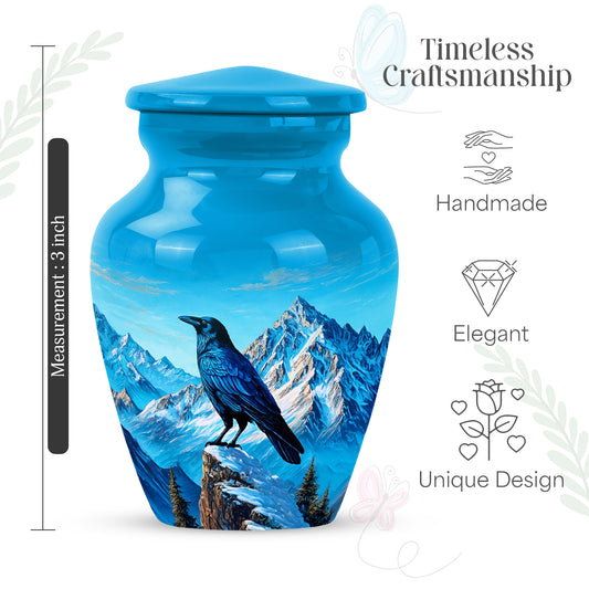 Pastel Blue Crow Cremation Urn close-up of engraving and surface detail - timeless crow motif etched into premium metal - mini keepsake memorial for portion of cremation ashes