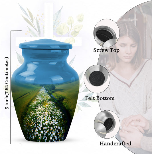 Azure Daisy Cremation Urn close-up of engraving and surface detail - classic sculpted daisy pattern on smooth aluminum - mini keepsake memorial for portion of cremation ashes