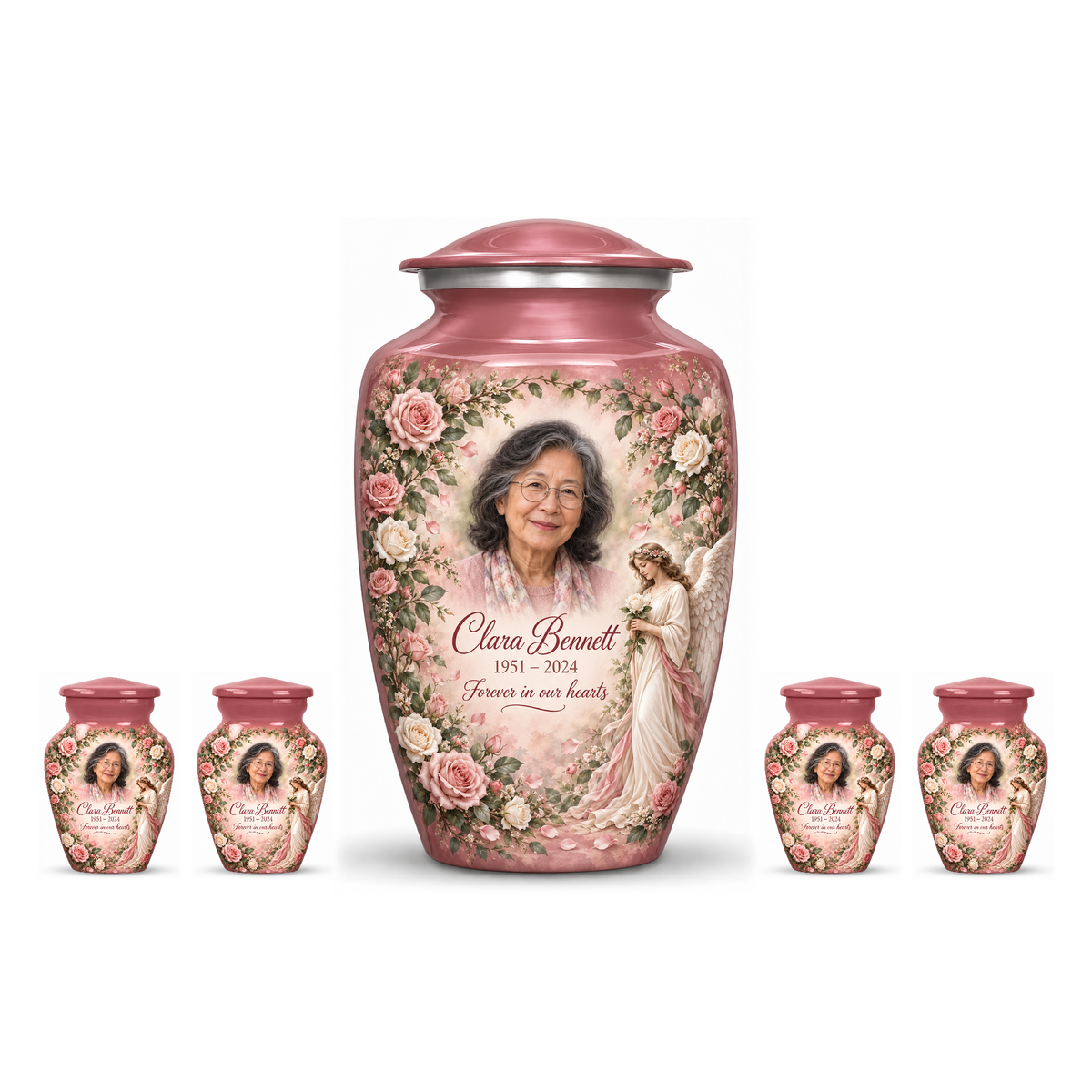 One pink adult angel urn and four keepsakes with an angel holding a white rose amid pink flowers on white.