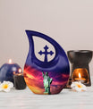 Cross Drop design, 10-inch Statue of Liberty and urns