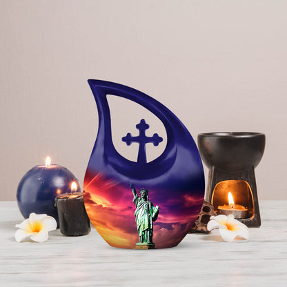Cross Drop design, 10-inch Statue of Liberty and urns