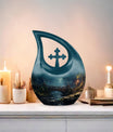 A 10-inch Wilderness Urn with Cross Drop design 