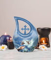 10-inch Blue Hummingbird Cross Drop urn, 