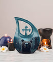 Bear-themed cross drop design urn