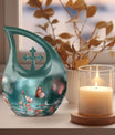 10 Inch Butterfly Urn with Cross Drop design