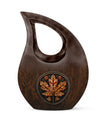 10 inch Mapple Leaf Urn with Cross Drop design, also a Cremation Vault