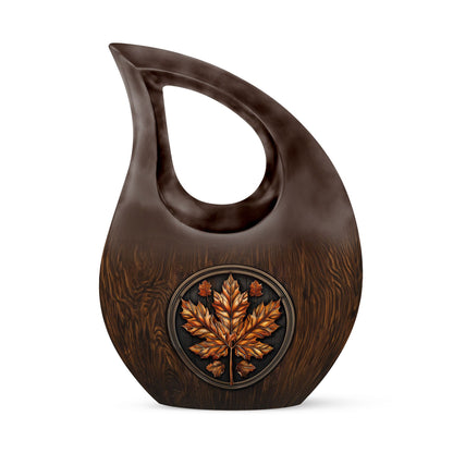 10 inch Mapple Leaf Urn with Cross Drop design, also a Cremation Vault