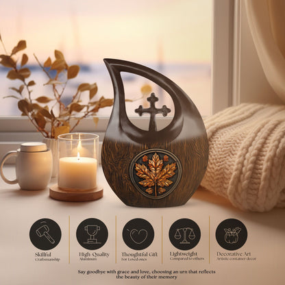 10 inch Mapple Leaf Urn with Cross Drop design, also a Cremation Vault
