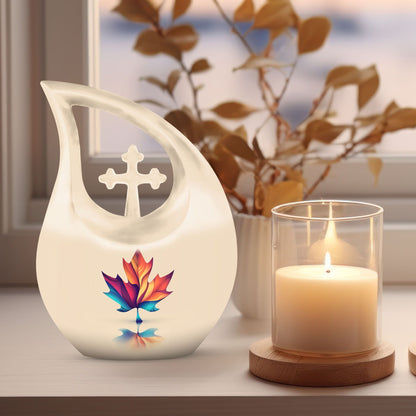 10-inch pink Mapple Leaf urn with Cross Drop design,