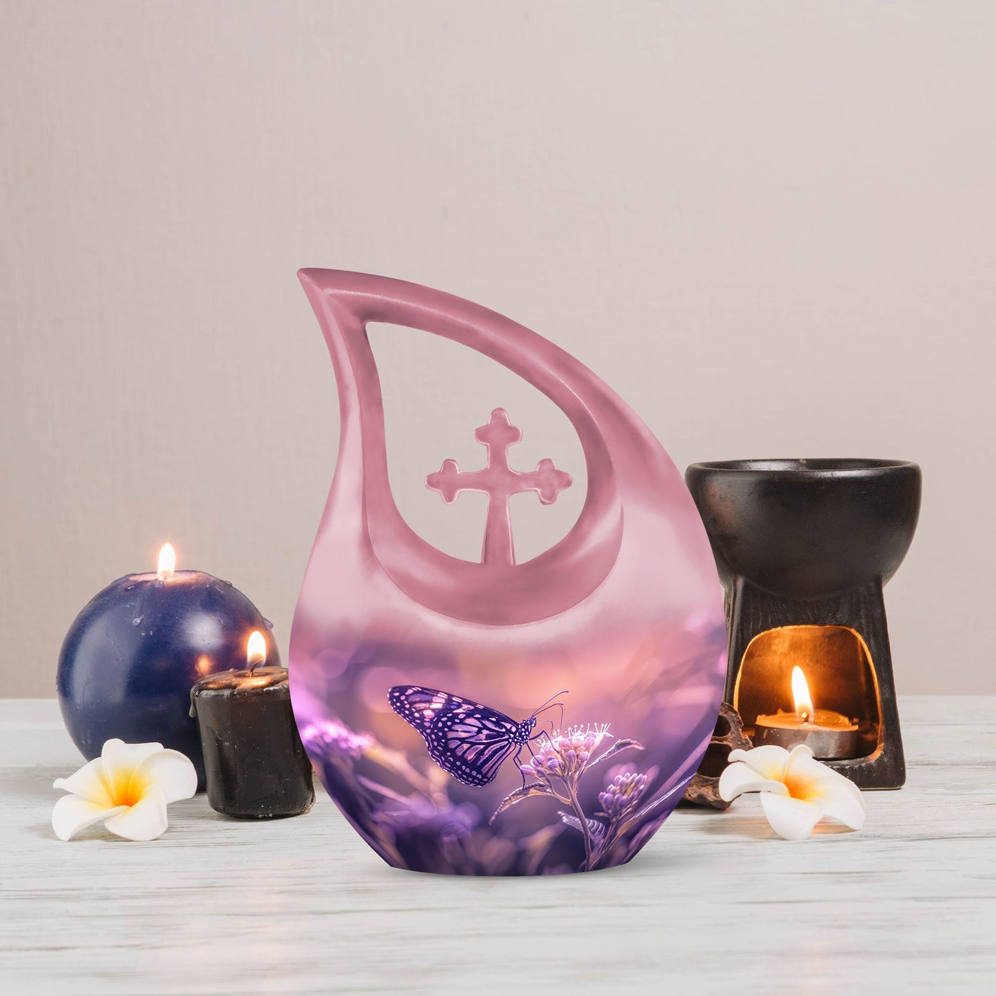 Butterfly urn featuring a cross