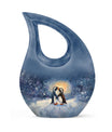 A unique Penguin themed Cross Drop Memorial Urn