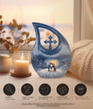 A unique Penguin themed Cross Drop Memorial Urn