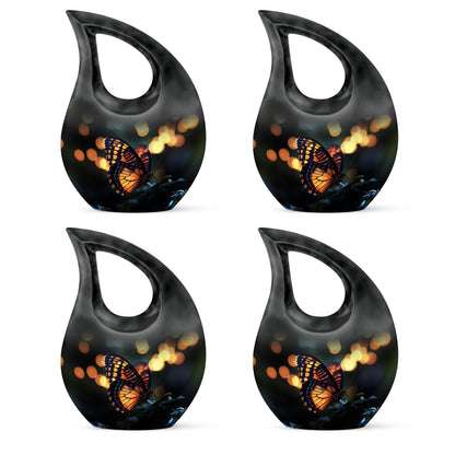 Midnight Black Butterfly Cremation Urn lifestyle display on memorial shelf - faith-inspired cross-drop urn with butterfly pattern - 10 inch aluminum urn for cremated remains