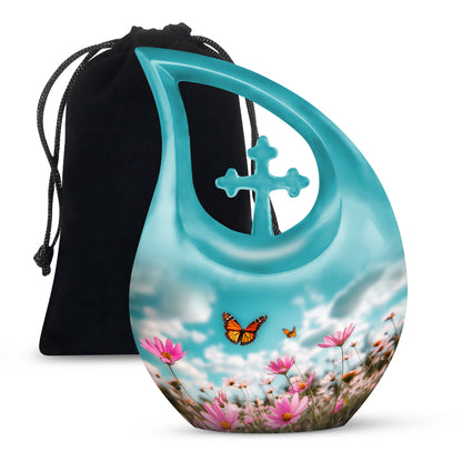 Sea Green Teal Butterfly Cremation Urn top-down view of secure threaded lid - sacred cross merged with butterfly motif on metal - full-size 10 inch 200 cubic inch adult cremation urn