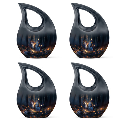 Rich Black Butterfly Cremation Urn lifestyle display on memorial shelf - sacred cross merged with butterfly motif on metal - 10 inch aluminum urn for cremated remains