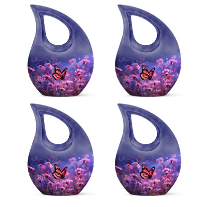 Twilight Blue Butterfly Cremation Urn lifestyle display on memorial shelf - faith-inspired cross-drop urn with butterfly pattern - 10 inch aluminum urn for cremated remains