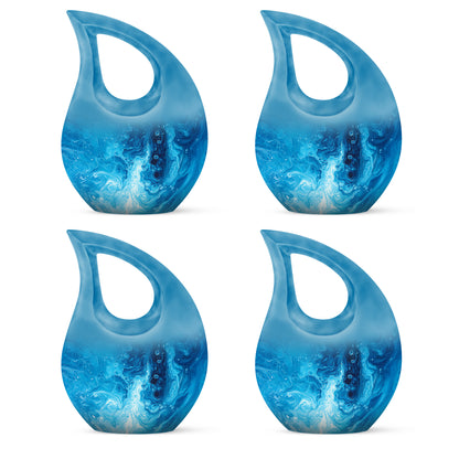 Icy Blue Blue Cremation Urn lifestyle display on memorial shelf - sacred cross merged with blue motif on metal - 10 inch aluminum urn for cremated remains