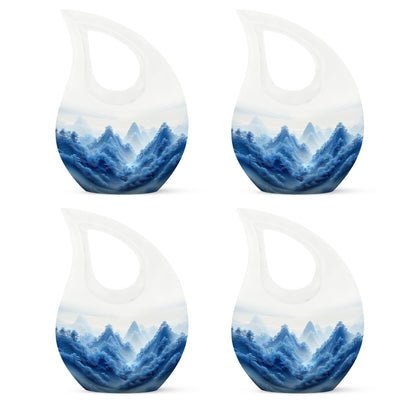 Frosted Silver Blue Cremation Urn lifestyle display on memorial shelf - faith-inspired cross-drop urn with blue pattern - 10 inch aluminum urn for cremated remains