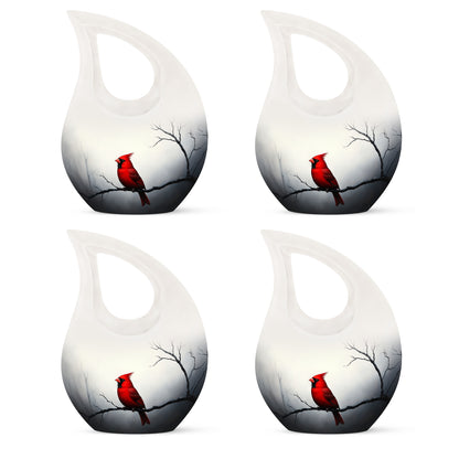Gleaming Silver Cardinal Cremation Urn lifestyle display on memorial shelf - cross and cardinal combined in spiritual memorial design - 10 inch aluminum urn for cremated remains