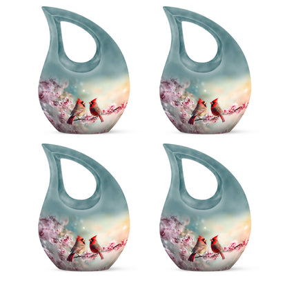 Aqua Teal Cardinal Cremation Urn lifestyle display on memorial shelf - faith-inspired cross-drop urn with cardinal pattern - 10 inch aluminum urn for cremated remains