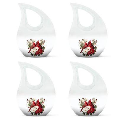 Brushed Silver Cardinal Cremation Urn lifestyle display on memorial shelf - sacred cross merged with cardinal motif on metal - 10 inch aluminum urn for cremated remains
