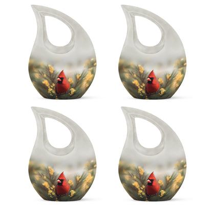Steel Gray Cardinal Cremation Urn lifestyle display on memorial shelf - faith-inspired cross-drop urn with cardinal pattern - 10 inch aluminum urn for cremated remains