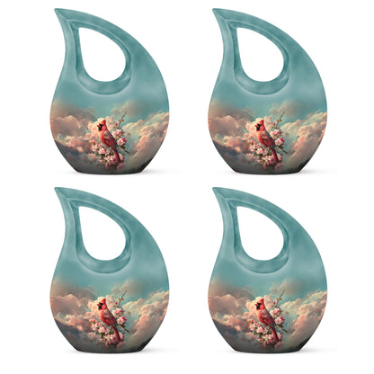 Cool Teal Cardinal Cremation Urn lifestyle display on memorial shelf - sacred cross merged with cardinal motif on metal - 10 inch aluminum urn for cremated remains