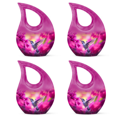 Pastel Pink Hummingbird Cremation Urn lifestyle display on memorial shelf - cross and hummingbird combined in spiritual memorial design - 10 inch aluminum urn for cremated remains