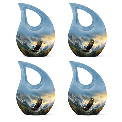 Icy Blue Eagle Cremation Urn lifestyle display on memorial shelf - sacred cross merged with eagle motif on metal - 10 inch aluminum urn for cremated remains