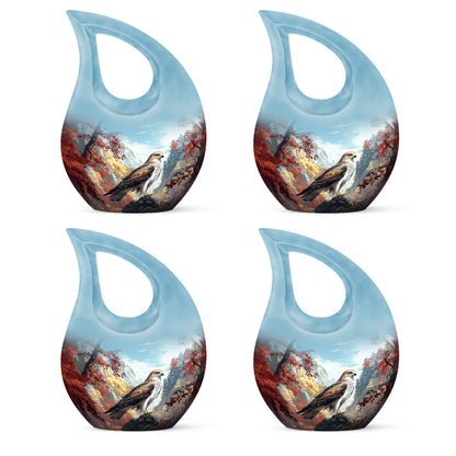 Steel Blue Eagle Cremation Urn lifestyle display on memorial shelf - devotional cross-drop eagle engraving - 10 inch aluminum urn for cremated remains