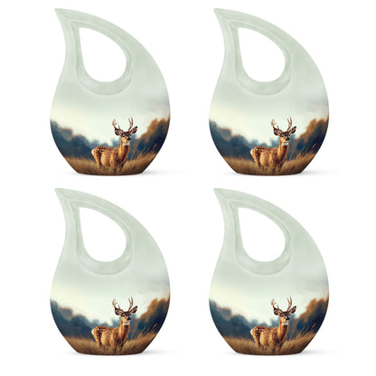 Brushed Silver Deer Cremation Urn lifestyle display on memorial shelf - cross and deer combined in spiritual memorial design - 10 inch aluminum urn for cremated remains
