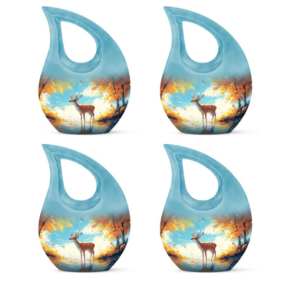 Soft Teal Deer Cremation Urn lifestyle display on memorial shelf - cross and deer combined in spiritual memorial design - 10 inch aluminum urn for cremated remains