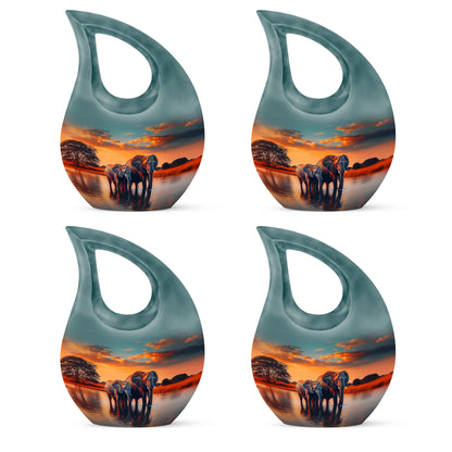 Mystic Teal Elephant Cremation Urn lifestyle display on memorial shelf - devotional cross-drop elephant engraving - 10 inch aluminum urn for cremated remains
