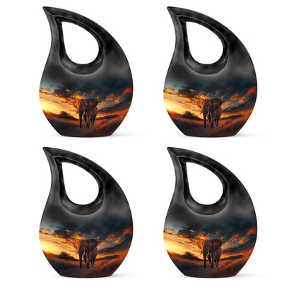 Rich Black Elephant Cremation Urn lifestyle display on memorial shelf - sacred cross merged with elephant motif on metal - 10 inch aluminum urn for cremated remains
