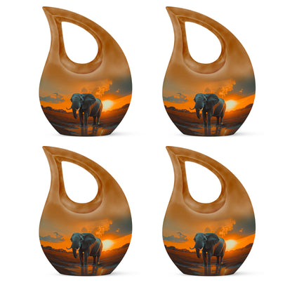 Sunrise Gold Elephant Cremation Urn lifestyle display on memorial shelf - sacred cross merged with elephant motif on metal - 10 inch aluminum urn for cremated remains
