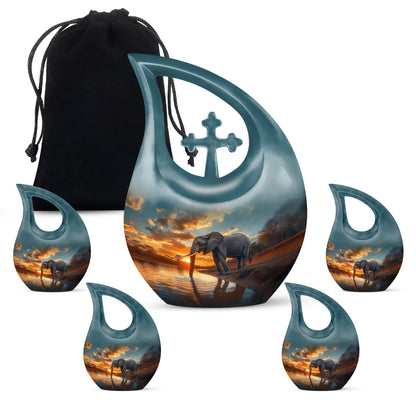 Sea Green Teal Elephant Cremation Urn urn with complimentary velvet bag - cross and elephant combined in spiritual memorial design - memorial set with one large and four small urns