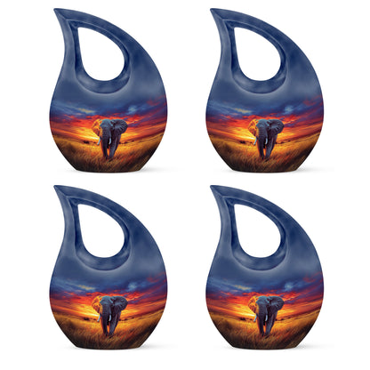 Indigo Elephant Cremation Urn lifestyle display on memorial shelf - sacred cross merged with elephant motif on metal - 10 inch aluminum urn for cremated remains