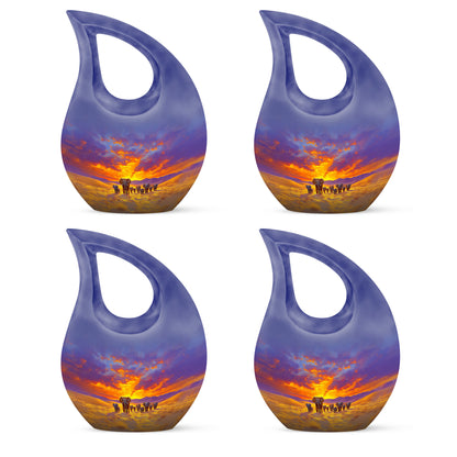 Steel Blue Elephant Cremation Urn lifestyle display on memorial shelf - faith-inspired cross-drop urn with elephant pattern - 10 inch aluminum urn for cremated remains