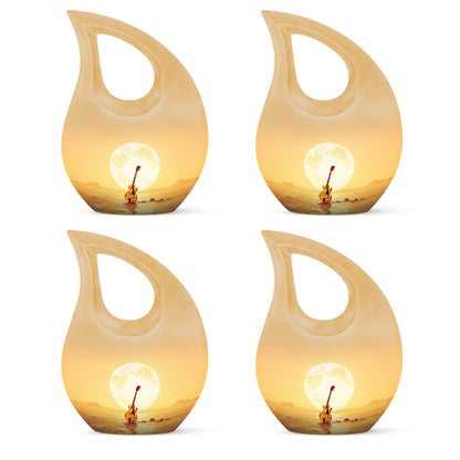 Amber Gold Guitar Cremation Urn lifestyle display on memorial shelf - cross and guitar combined in spiritual memorial design - 10 inch aluminum urn for cremated remains
