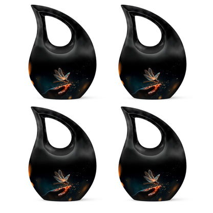 Glossy Black Dragonfly Cremation Urn lifestyle display on memorial shelf - cross and dragonfly combined in spiritual memorial design - 10 inch aluminum urn for cremated remains
