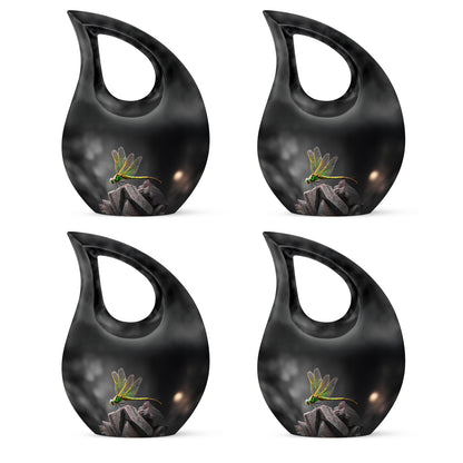 Midnight Black Dragonfly Cremation Urn lifestyle display on memorial shelf - devotional cross-drop dragonfly engraving - 10 inch aluminum urn for cremated remains