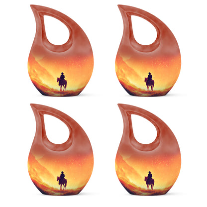 Sunrise Gold Cowboy Cremation Urn lifestyle display on memorial shelf - sacred cross merged with cowboy motif on metal - 10 inch aluminum urn for cremated remains