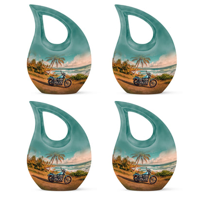 Aqua Teal Bike Cremation Urn lifestyle display on memorial shelf - devotional cross-drop bike engraving - 10 inch aluminum urn for cremated remains
